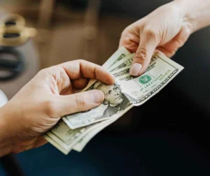 hands-holding-money