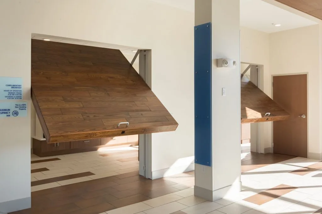 Tilting garage-style breakfast room doors - Platteville Holiday Inn Express