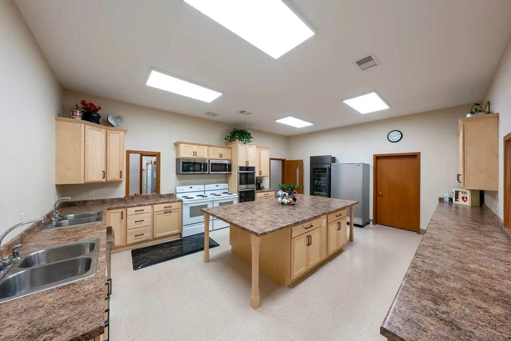 Burke Lutheran Church - Kitchen with ample workspace and pantry for storage