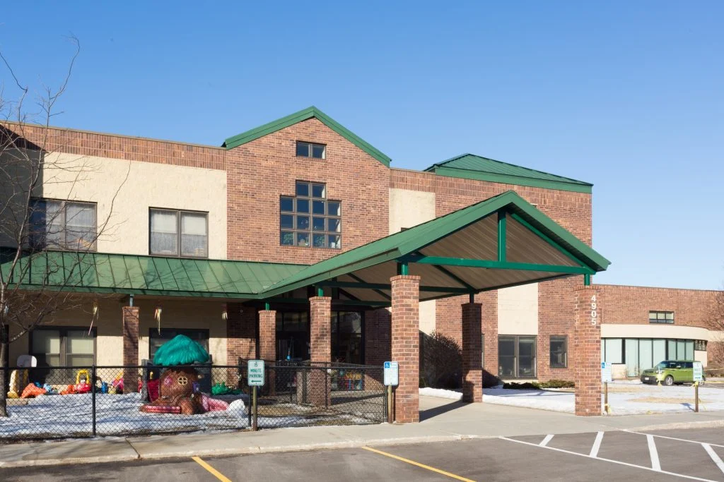 Campus for Kids - Brick exterior with metal roofing
