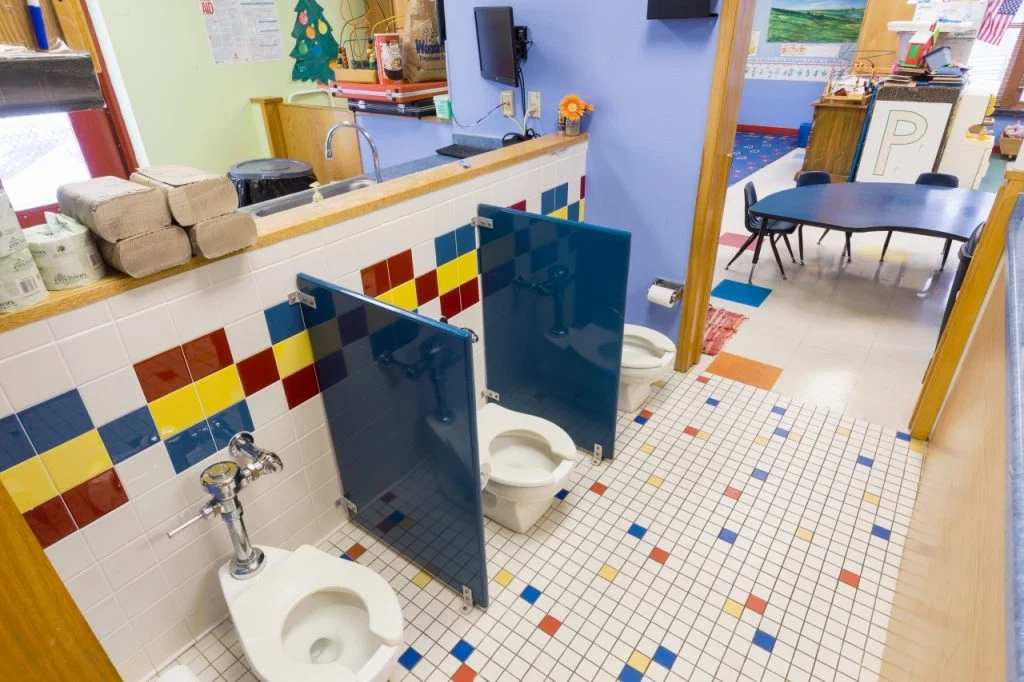 Campus for Kids - Child-size toilets and partition walls for privacy and supervision