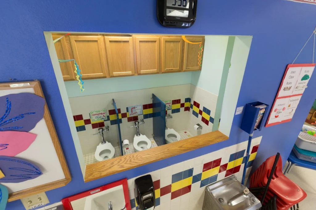 Campus for Kids - Window looking into children's restroom allows for convenient supervision