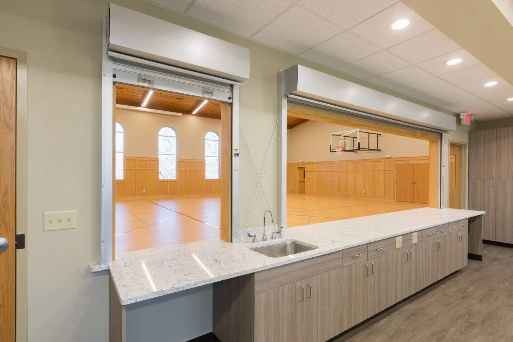 Fulton Church - Full kitchen and view into gymnasium