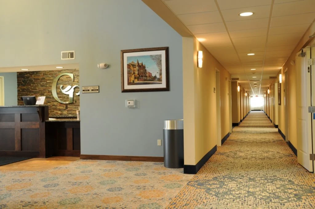 GrandStay Hotel & Suites Front desk and hallway