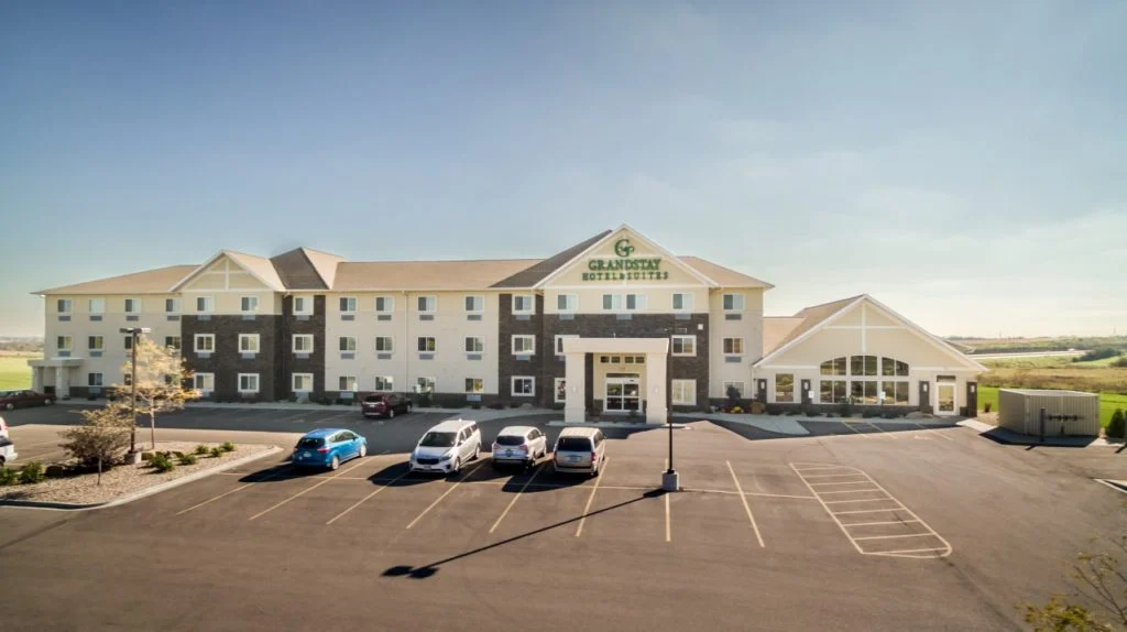 GrandStay Hotel & Suites Three-story, wood frame hotel