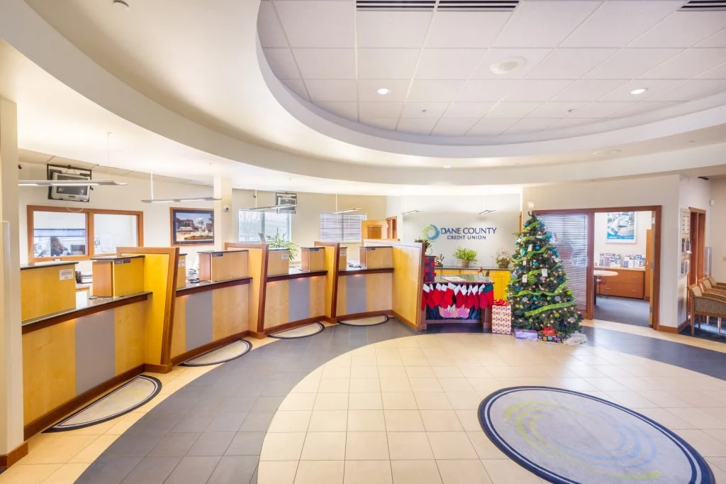 Heartland Credit Union Patterned tile floor and maple and cherry hardwoods