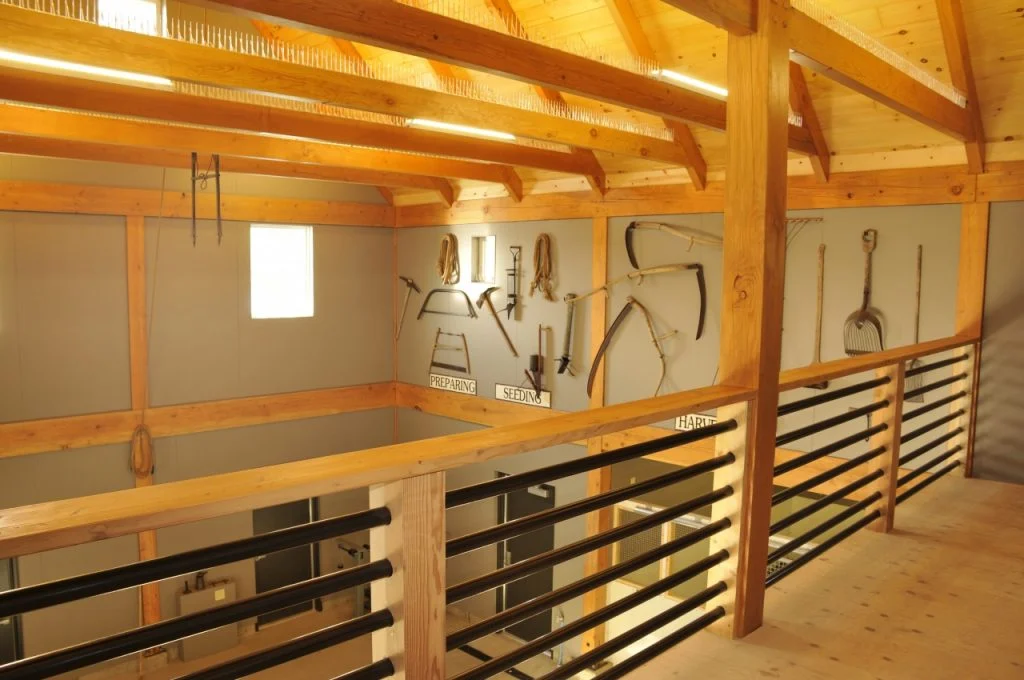 Henry Vilas Zoo Children’s Barn and Train Depot - Exposed timber beams and metal railing