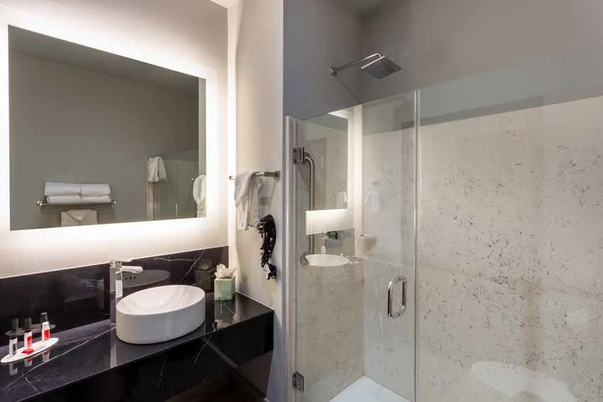 Hotel of the Arts Baymont Inn & Suites Bathroom with high-end finishes
