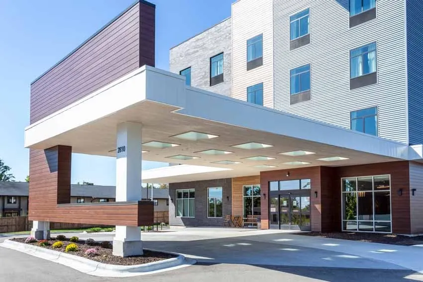 Hotel of the Arts Baymont Inn & Suites Large covered entrance