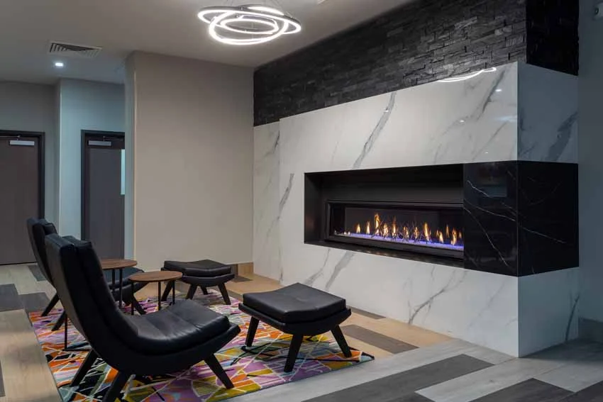 Hotel of the Arts Baymont Inn & Suites Lobby fireplace
