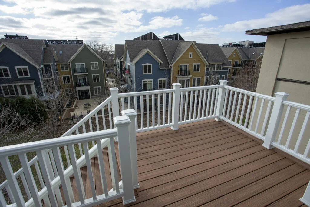 Housing with new siding New deck and railing
