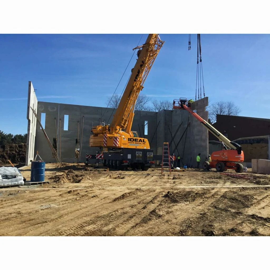 Our Redeemer Lutheran Church and School - A crane sets wall panels