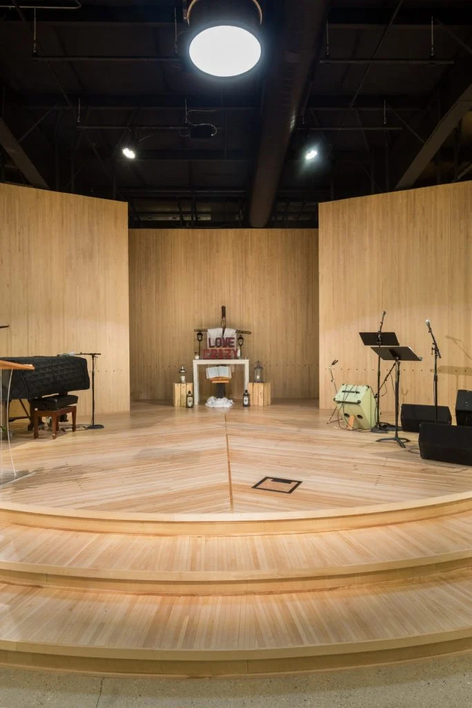 Sugar River United Methodist Church - Wood from the bowling lanes used as finishing material on the stage floor and sanctuary walls