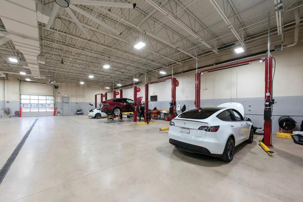 Tesla Service Center Tesla-specific lifts and new lighting
