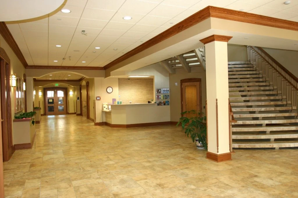 Wisconsin Lutheran Chapel & Student Center - Information desk and stairway