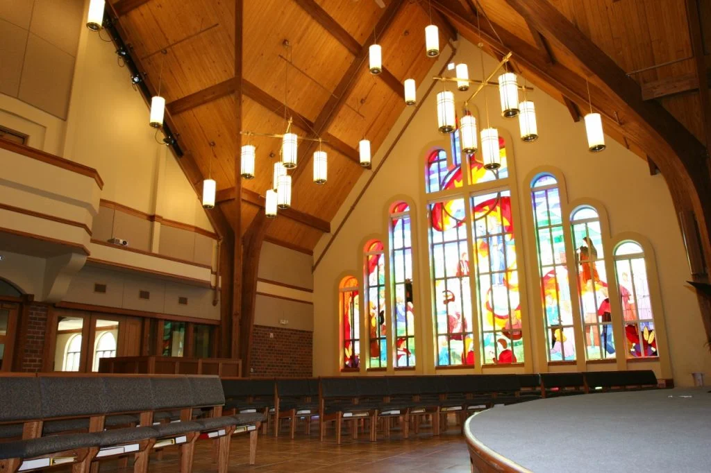 Wisconsin Lutheran Chapel & Student Center - Sanctuary with stained glass windows