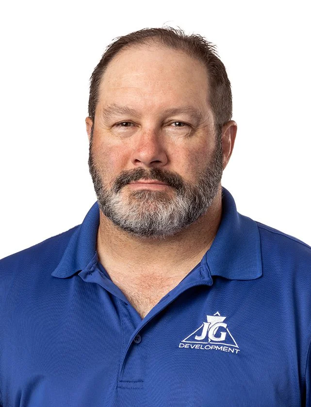 Greg McGuire staff