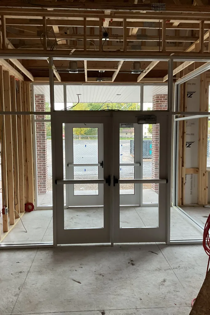 progress photo of building entrance under construction